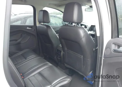 2016 Ford Escape Titanium z USA, uszkodzony, nr VIN 1FMCU9J95GUB81033